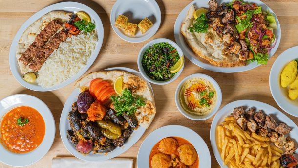 When I travel to exotic foreign countries, I love to learn about their culture, and immerse myself in the local cuisine. Jordan is a country that evokes images of surreal desert landscapes, ancient historical ruins and monuments, and important religious sites, But diverse Middle Eastern-influenced food in Jordan is also an experience onto itself, especially since it’s served with the renowned Jordanian and Bedouin hospitality. The staples of Jordanian cuisine are similar to those of other Middle Eastern countries, due to centuries of shared history and trade. Some of my favorite restaurants in Jordan: • Sufra, Amman – a lovely historic villa on Rainbow Street – regarded as the best restaurant in Jordan and is frequently visited by the royal family. Make sure to ask for a table outside on the garden patio surrounded by flowers. • Habibah Sweets, Amman – the oldest sweet shop in Amman. Here you'll find the best knafeh in Jordan. • Sakeyat Addaraweesh, Amman – specialty was food cooked in clay pots that were cracked open when finished. • Frankfurter Coffee Shop & Bakery, Madaba – delicious Medjool dates, baklava, sesame cookies, and of course Turkish coffee. • Sheikh Alhara, Aqaba – seafood like grouper and shrimp. • Berenice Beach Club, Aqaba – what can I say, when you just have to have a pizza. Jordan Traditional Food Shawarma A legacy originating from the former Ottoman empire, Shawarma is made from slowly-rotating spits of sliced lamb, chicken or beef. The tasty meat is cut in thin slices, put in warm pockets of pita bread, then topped with yogurt and za'atar, a spice blend made with tangy sumac. I tried both lamb and chicken shawarma; the lamb was hands-down more delicious and savory than the chicken. Lamb Lamb is one of the tastiest meats around, and loved by most Middle Eastern countries. My favorite is the lamb kebab – spiced chunks of lamb, skewered and then grilled to savory perfection. If there’s a tastier carnivore choice, I haven’t found it yet. Felafel Crisp balls of falafel shaped from spiced, ground chickpeas are a street food staple across the Levant. Jordan, falafels are much larger and freshly prepared, which gives them greater texture and a brighter color, particularly in restaurants than the street-food variety which I found to be very dry and lacking flavor. Diverse falafel is served for breakfast, snacks, a stuffed into warm pita bread for a quick sandwich. Hummus Hummus is made from chickpeas pureed smooth with tahini, olive oil, lemon juice, salt and garlic, and traditionally served with flatbread or with falafel. Sambosic Sambosic, also known as samosa in other Asian countries, is a fried filo dough pastry with a savory filling of cheese. They are usually served as a starter, but they are so light and delicious that I would be very happy to make my meal of these. One of my favorite Jordanian foods; in fact, I was scarfing them down so fast, I almost didn’t get to get a photo! Mezze In Middle Eastern cultures, meals are a multi-course affair. Mezze traditionally refers to smaller items served at the beginning of the meal. A typical mezze includes foods such as kibbeh, labaneh, baba ghanoush, tabbouleh, olives, pickles, hummus, and pita bread. Fattoush Fattoush is an aromatic salad of garden veggies and fried pieces of pita bread often spiced with sumac. Kobbeh Kobbeh is a fulfilling hand-held croquette consisting of a mix of bulgur, finely ground meat, onions, peppers, and spices, and shaped like an American football and deep fried until it’s crispy and brown. Kobbeh is eaten as a starter, mezze, snack or as a side dish. Tabbouleh Tabbouleh is a traditional Middle Eastern dish made of bulgur, tomatoes, parsley, mint and onions with olive oil, lemon juice and salt for seasoning. Maqluba The word maqluba means "upside down," and it's a dish that dates back to 13th-century Kitāb Al-tabīkh, a collection of recipes from medieval Baghdad. Maqluba's is Jordan’s version of comfort food, and the drama is all in the presentation, not in the taste, IMHO. Spiced rice, chicken, potatoes and vegetables are placed in an earthen pot and cooked for a long time over low heat. When done, the large pot is inverted tableside. It wasn’t my favorite dish as I don’t eat rice, potatoes or vegetables, and chicken is my least favorite meat, but it may be worth a try for you. Galayet Bandora Galayet Bandoret is made with stewed tomatoes, mushrooms, onions, garlic, and olive oil which are placed in a clay pot and slow cooked. It’s a kind of simple tomato stew, accompanied with rice or bread. My vegetarian friend ordered it and allowed me to sample – it tasted like stewed tomatoes to me…I wasn’t fond of it – I liked by grilled lamb much better. Turkish Coffee Thick, rich, and spiced with Cardamom, Turkish coffee is an acquired taste. Sometimes described as “mud-like,” I do like the taste…and the dramatic pick-me-up! Bedouin Food With a long tradition as nomads, Jordan's Bedouin people have developed a cuisine that's perfectly adapted to cooking over desert campfires and in dug-out fire pits. Zarb After a full day exploring the exquisite sand dunes and riding camels in the Wadi Rum, desert, you’ll be ready for the Bedouin hospitality and cooking in your camp. A hearty meal best eaten under the stars, zaarb is the Bedouin version of barbecue, made from marinated lamb and chicken mixed with chunks of vegetables, placed on a covered rack, then baked in a dug pit lined with hot stones and coals and covered over by sand and blankets to roast for hours, until the meat falls off the bone. Mansaf Celebrated as Jordan's national dish, mansaf has deep roots in the nomadic Bedouin tradition who roamed the desert. It’s a traditional dish that thrives throughout the Levant, with recipes appearing from Israel to Iraq. Love of mansaf unites all Jordanians. Because water was scarce, mansaf is made with dehydrated ingredients, such as rice and dried yoghurt called jameed. Chunks of lamb (or sometimes camel) are marinated with fermented jameed, cooked, and served on a bed of bulgur or rice drizzled with yogurt sauce. Cinnamon Tea But there are Bedouin tents lining even the most remote deserts of Wadi Rum, and many hikers are invited for tiny glasses of sweetened tea. Sharing tea is an important part of Bedouin culture, as is their remarkable hospitality. The delicious tea is often steeped with sweet cinnamon and aromatic sage and cardamom. Jordan Sweets Sweets in Jordan have a complexity to them that American sweets do not. The use of spices and layers of flavor produce desserts that have bold and delicate, sweet and savory aspects that are positively addicting. Kunafeh Kunafeh is said to have spread across the Levant with Ottoman rule. It’s a traditional Jordanian pastry made with two layers of crispy filo dough with hot tangy Akkawi cheese in the middle, thin noodles on top for extra texture and crunch, and covered with sticky, sugary sweet syrup that oozes from the edge of the pastry. It is sometimes flavored with rose water and/or pistachios.The combination of savory and sweet, crunchy and soft, and warm and cool sensations is ridiculously delicious! The best kunafeh in all of Jordan is hands-down Habibah Sweets, the oldest sweet shop in Amman. Their kunafah is legendary! Medjool Dates Medjool dates are a variety of dates enjoyed for their superior natural sweetness and chewy texture. They're larger, darker, and a richer, almost caramel-like taste than other dates. They positively melt in your mouth. I don’t typically eat fruit, but I could not get enough of these! Baklava Baklava is Kanafeh’s main rival as Jordan’s preferred desert. While the name may sound familiar, the Middle East baklava isn’t as sticky or soaked with honey as say the baklava of Greece. Layers of flaky phyllo pastry alternate with a paste made of butter, walnuts and a sugary honey syrup. Unlike the huge chunks I’ve found in other Mediterranean and Middle East countries, the baklava is cut into small, bite size pieces. This means I had to eat quite a few to satisfy my ravenous sweet tooth. Sesame Cookies We found small, crunchy sesame biscuit-like cookies in a family-owned bakery in Madada. The less sweet and crunch were a nice contrast when eating alongside dates and baklava. Click below to PIN so you can find food in Jordan again: Disclosure: The author partnered with G Adventures during her stay in Jordan, but as always, the opinions, reviews, and experiences are her own. About the Author Patti Morrow is a freelance travel writer and founder of the award-winning international blog Luggage and Lipstick and southern travel blog Gone to Carolinas. TripAdvisor called her one of “20 Baby Boomer Travel Bloggers Having More Fun Than Millennials” and she was named one of the “Top 35 Travel Blogs” in the world. Patti is the author of the book “Girls Go Solo: Tips for Women Traveling Alone,” and has over 150 bylines in 40 print and online publications, including The Huffington Post, International Living Magazine, Washington Post Sunday Travel, Travel Girl, Travel Play Live Magazine, and Ladies Home Journal. She has traveled extensively through six continents looking for fabulous destinations, exotic beaches, and adventure activities for her Baby Boomer tribe.